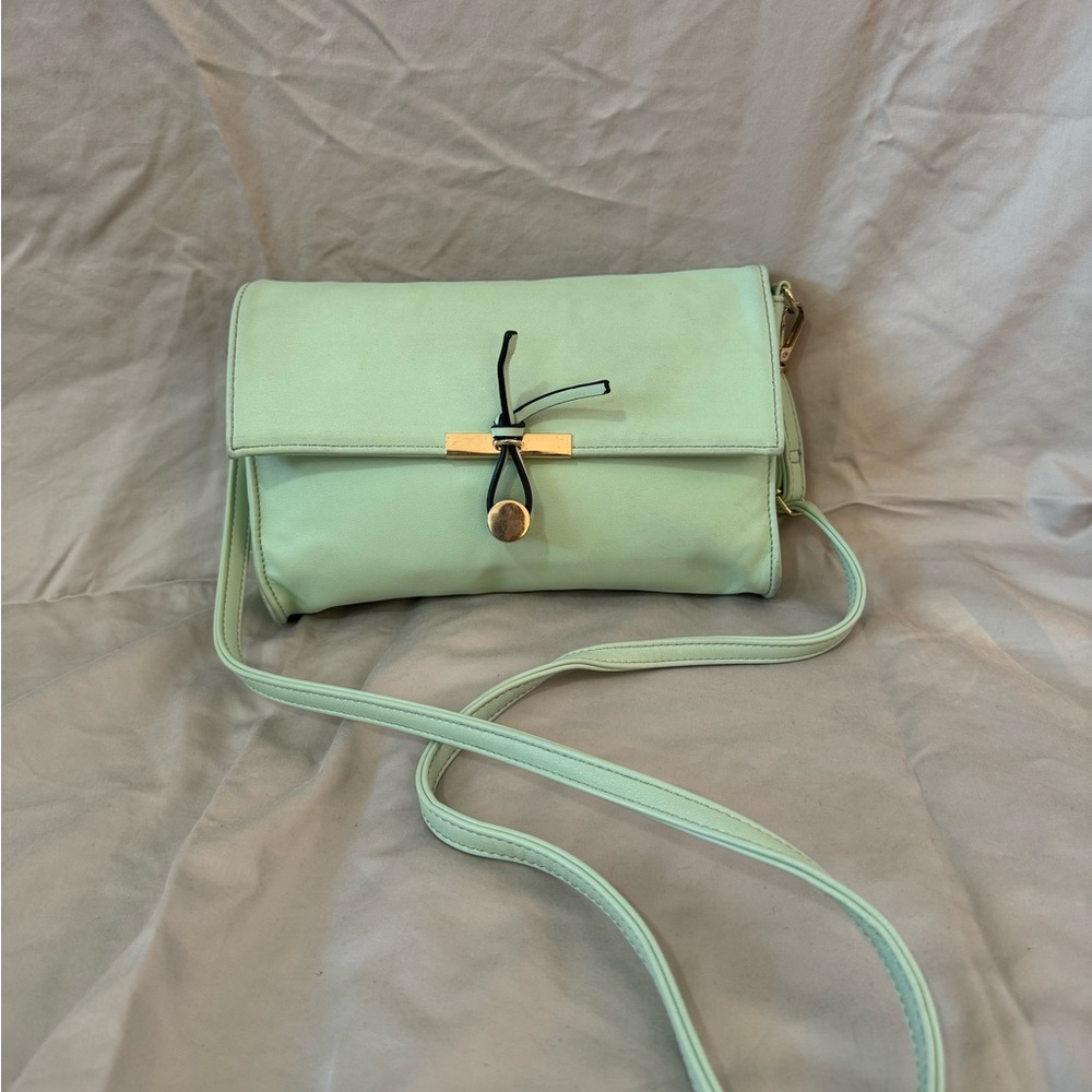 Teal cross body